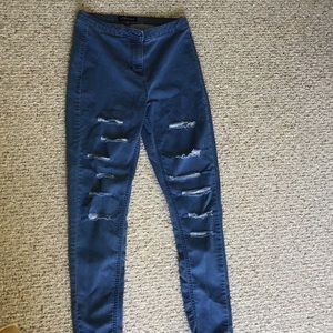 High-rise cotton/polyester pants.